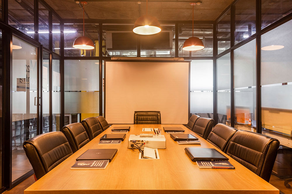 Well-designed open-plan workspace in coworking office